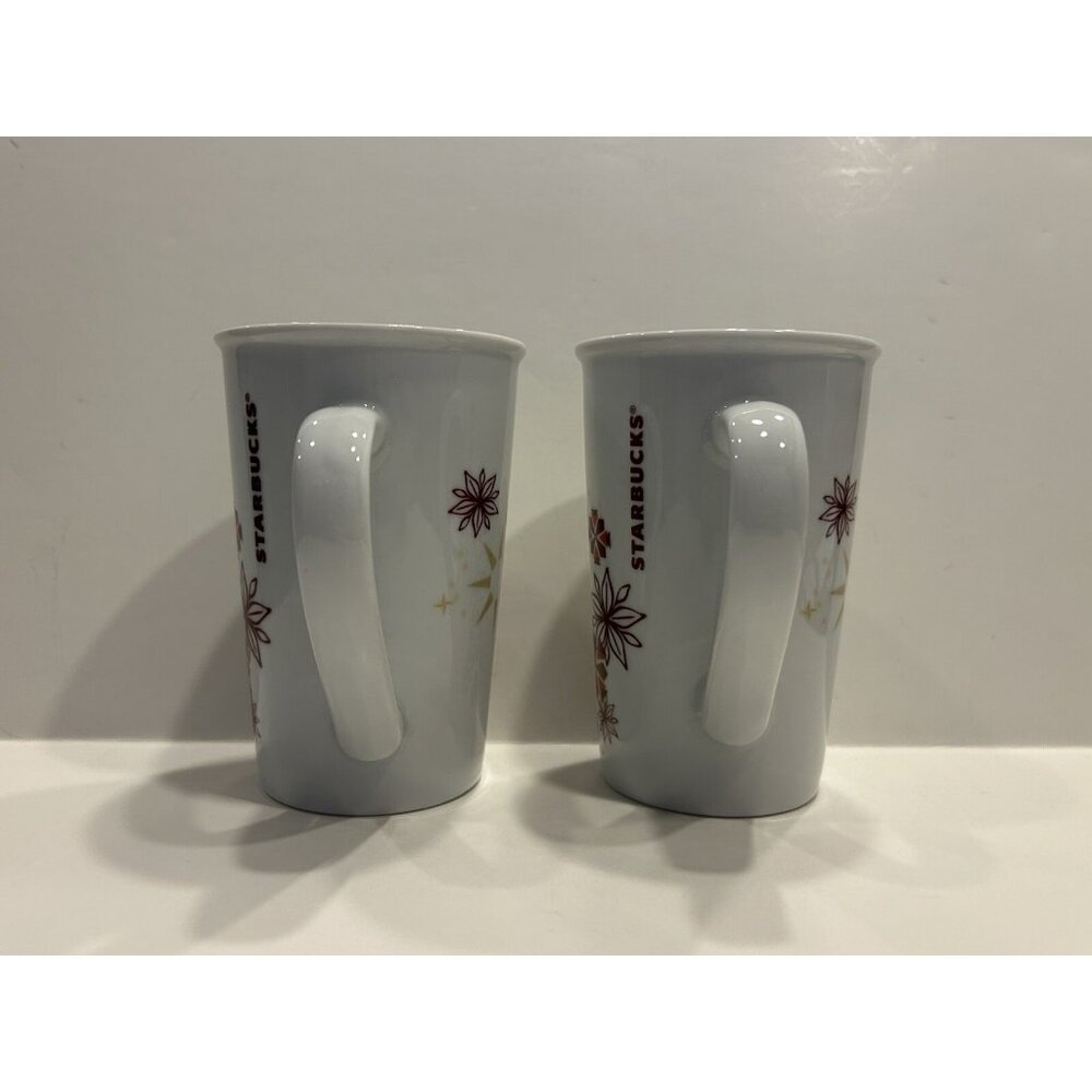Starbucks Cups Set of 2 Holiday Winter Star Snowflake Poinsettia Christmas 12 oz - Picture 2 of 13
